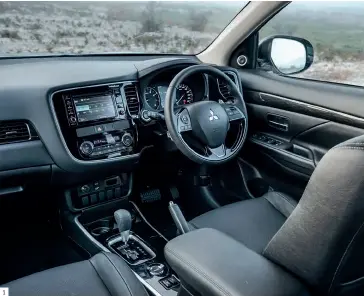  ??  ?? 1 The cabin feels rock-solid and seating comfort is tops. 2 Legroom in the second row is commodious, so much so that the bench can be moved quite a way forward to release more space for the third row.
3 The Outlander looks chic and upmarket. 4 A black...