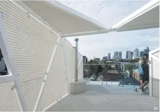  ??  ?? 01 Perforated panels provide shade and privacy, while also framing views of the city.