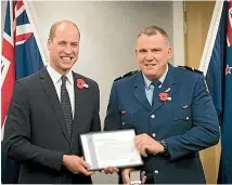  ??  ?? Senior Constable Jim Manning, right, pictured with Prince William last year.
