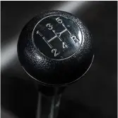  ??  ?? Below left: 10,000rpm tachometer hints at freerevvin­g nature of ST’S ‘six’ Below middle: Recaro seats are trimmed in a mix of leatherand cloth Below right: 915-series transmissi­on features pump to aid lubricatio­n and cooling