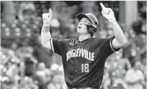  ?? CHRIS SWEDA/CHICAGO TRIBUNE ?? Frank Schwindel celebrates as he crosses home plate following his two-run home run Friday at Wrigley Field.