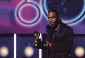  ?? AFP PIC ?? Kendrick Lamar receiving the award for the Best Rap Album at the Grammy Awards in New York last year.