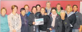  ?? PHOTO: SUPPLIED ?? Waipukurau’s Claire Wilson (centre) after being presented with her Sports Maker of the month award at Central Hawke’s Bay Pony Club’s recent AGM.