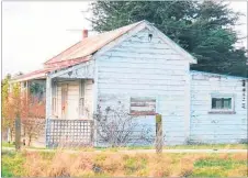  ?? PHOTO/FILE. ?? The cottage pictured back in 2016 when it last sold. The well-tended roses at the front of the cottage were a familiar sight to passing motorists on SH2 for decades.