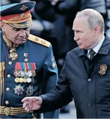  ?? AFP ?? RUSSIAN President Vladimir Putin and his Defence Minister Sergei Shoigu leave Red Square after the Victory Day military parade in Moscow on Monday. While the nation celebrated the 77th anniversar­y of the victory over Nazi Germany during World War II, a victory in Russia’s February 24 invasion of its neighbour Ukraine remains elusive, says the writer. |