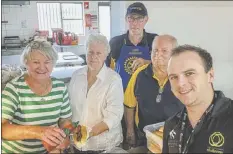  ??  ?? Supporters Margaret Donoghue and Maureen Murray-wilcox with Rotarians Ray Brooks and Lawrie Donoghue served lunch to the hungry hordes, including Matt from the University of Newcastle Science Challenge team.