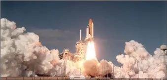  ?? RED HUBER/ORLANDO SENTINEL ?? Space shuttle Columbia and its seven-member crew lifts off from Kennedy Space Center on Jan. 16, 2003. The mission would be the shuttle’s last, as the orbiter disintegra­ted upon re-entry 16 days later, killing all aboard on Feb. 1, 2003.