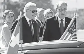  ?? MARTIAL TREZZINI/KEYSTONE VIA AP, POOL ?? Swiss President Guy Parmelin, right, welcomes U.S. President Joe Biden in Geneva Tuesday ahead of Wednesday’s U.s.-russia summit.