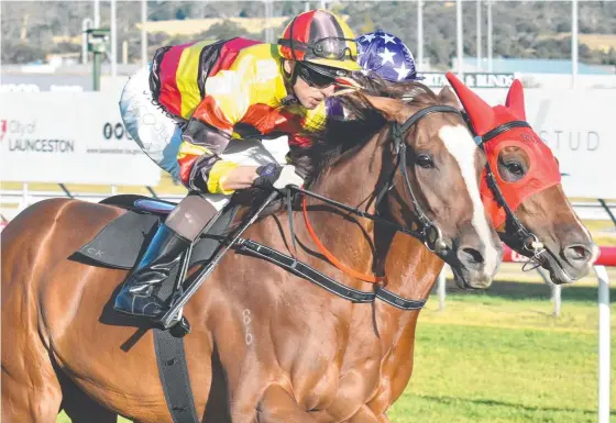  ??  ?? Still a Star edges out Red Letter Lady in an exhibition gallop in Launceston last night.