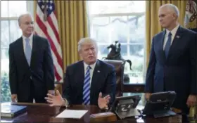  ?? PABLO MARTINEZ MONSIVAIS — ASSOCIATED PRESS ?? President Donald Trump, flanked by Health and Human Services Secretary Tom Price, left, and Vice President Mike Pence, right, speaks about the health care overhaul bill, Friday, in the Oval Office of the White House in Washington.