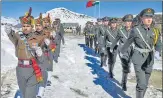  ?? PTI ?? Indian and Chinese soldiers celebrate the new year along the n
Indo-china border in Arunachal Pradesh on Jan 1, 2019.