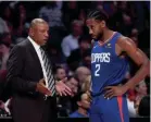  ?? KELVIN KUO/AP ?? Doc Rivers, Kawhi Leonard and the Clippers are second in the Western Conference as the NBA prepares to resume the season.