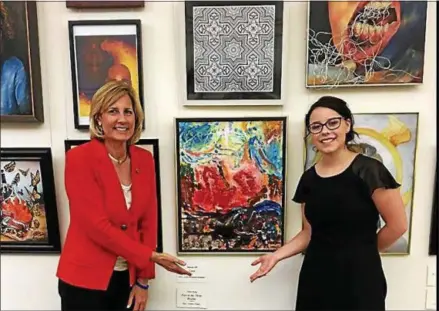  ?? PHOTO COURTESY CLAUDIA TENNEY’S OFFICE ?? Congresswo­man Claudia Tenney, R-22, stands with Claire Nolan in front of her artwork in the U.S. Capitol Tunnel.