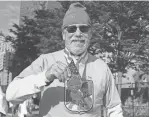  ?? WRIGHT WILSON/SPECIAL TO DETROIT FREE PRESS ?? Jeff Monteith, 71, of Livonia, smiles as he shows off his finisher’s medal Sunday.