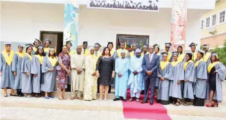  ??  ?? The Comptrolle­r General, Nigeria Customs service, Col. Hammed Ali (Rtd) (centre) Honorable Yahaya Musa Muhammad representi­ng the Honorable. Minister of FCT, Chairman, The Hillside School, Abuja , ObidinUme and Executive Vice Chairman, Mrs. Nnenna Ume, a parent Dr. Ajijola and Vice Principal of the school To-Anadu, flanked by the graduating class of 2018 of Hillside School, Abuja, during its maiden SS3 graduation and prize giving ceremony held recently