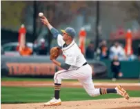  ?? PHOTO BY AMANDA IZZI/TENNESSEE ATHLETICS ?? Tennessee senior Hunter Martin pitches during a 6-5 win against Georgia on March 31 in Knoxville. While the Vols have struggled this season, Martin has been a reliable option as the No. 1 pitcher for weekend series.