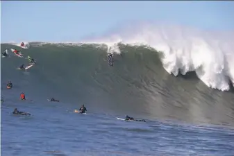  ?? Fred Pompermaye­r / Red Bull Media House ?? Bigwave surfer Kai Lenny didn’t fall off his board once at Mavericks. “I felt like there wasn’t a wave that was too big,” he said. “It was just a matter of being in the right place.”
