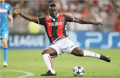  ?? — AFP ?? NICE: Nice’s Italian forward Mario Balotelli kicks the ball during the UEFA Champions League play-off football match between Nice and Napoli at the Allianz Riviera stadium in Nice, southeaste­rn France, on Tuesday.