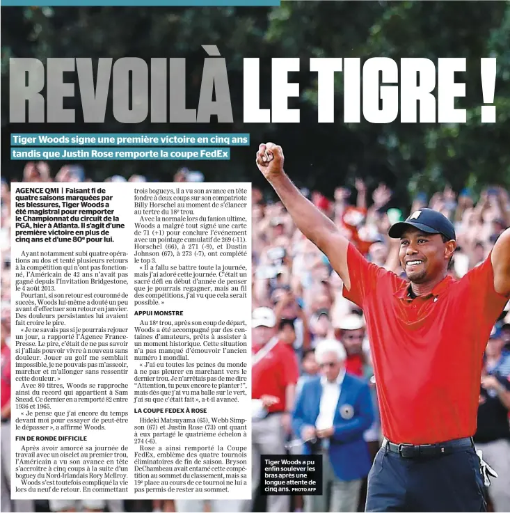  ?? PHOTO AFP ?? Tiger Woods a pu enfin soulever les bras après une longue attente de cinq ans.