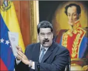  ?? Ariana Cubillos Associated Press ?? VENEZUELAN President Nicolas Maduro decried the charges as a conspiracy by the U.S. and Colombia.