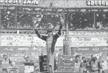  ?? Michael C. Johnson/USA TODAY Sports ?? NASCAR Cup Series driver Chase Elliott (9) celebrates in Victory Lane winning the NASCAR Cup Series AutoTrader EchoPark 400 at Texas Motor Speedway on April 14.