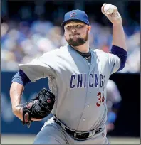  ?? AP/ALEX GALLARDO ?? Jon Lester earned his 12th victory of the season as he struck out 7 and gave up 3 runs in 51/3 innings as the Chicago Cubs beat the San Diego Padres 7-4 on Sunday at Petco Park in San Diego.