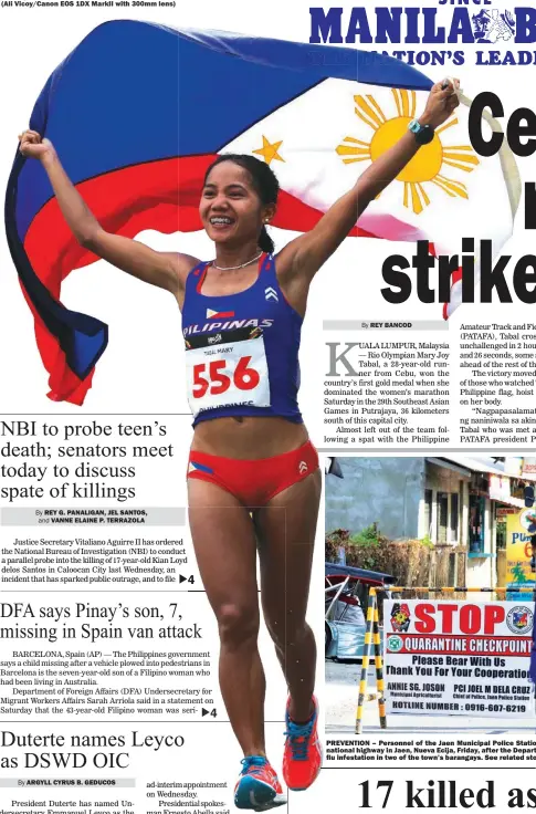  ?? (Ali Vicoy/Canon EOS 1DX MarkII with 300mm lens) ?? FOR FLAG AND COUNTRY – Mary Joy Tabal wins the first gold medal for the Philippine­s in the 2017 Southeast Asian Games in women’s marathon, Saturday, in Kuala Lumpur, Malaysia. The biennial meet officially opened last night at the 80,000-seat Bukit...