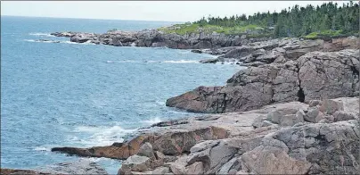  ?? CAPE BRETON POST ?? In this file photo, waves lap against the shoreline at MacKinnon’s Cove, one of the many scenic areas that can be seen during a drive around the Cabot Trail.