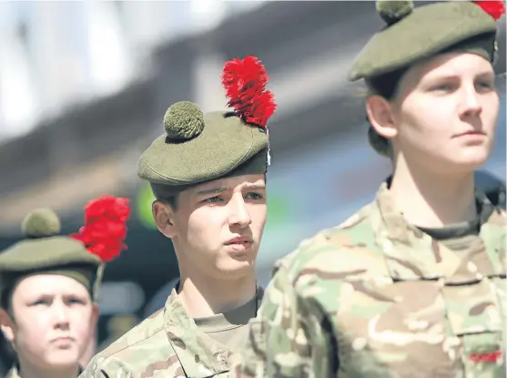  ?? Picture: Kris Miller. ?? Then and now: Victoria Schofield’s official history of the regiment runs from 1899 to 2006. Black Watch cadets marching from Dundee High School to City Square during the Armed Forces Day parade in Dundee on Saturday.