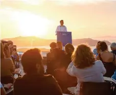  ??  ?? The sun setting over the Santorini caldera was certainly a spectacula­r backdrop to Prime Minister Kyriakos Mitsotakis’ press conference heralding the opening of the Greek tourism season, but did it send the right message?