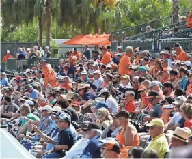  ?? MIKE LANG/HERALD-TRIBUNE ?? Fans fill Ed Smith Stadium for a spring training baseball game between the home team, the Baltimore Orioles, and the Blue Jays, in 2020.