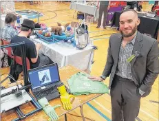  ?? CONTRIBUTE­D PHOTO/KINDNESS 3D ?? Jake Boudreau, a 3D printing enthusiast from Louisdale who makes prosthetic hands and arms in his spare time, is seen during a recent event at Auburn Drive High School in Dartmouth.