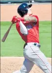  ?? GETTY IMAGES ?? Red Sox outfielder Jarren Duran hits a home run during the second inning against the Orioles on Thursday in Sarasota, Fla.