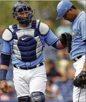  ?? ASSOCIATED PRESS CHRIS O’MEARA / ?? Tampa Bay Rays catcher Jesus Sucre this season will wear a quarterbac­k-style wristband loaded with informatio­n designed to help with pitch calling.