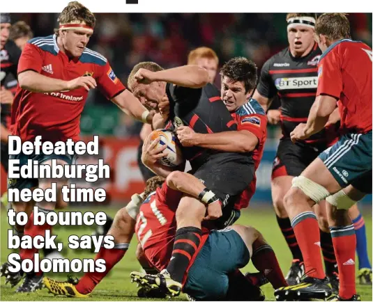  ??  ?? Smash and grab: Edinburgh’s William Nel is stopped in his tracks by Munster