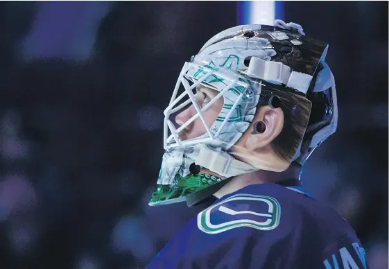  ?? — CP FILES ?? Jacob Markstrom will have his hands full in the Canucks’ season opener Saturday when Connor McDavid and the Oilers visit.