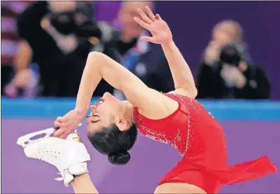  ?? [JULIE JACOBSON/THE ASSOCIATED PRESS] ?? Mirai Nagasu became the first American woman to land a triple axel in the Olympics, hitting it in the women’s free skate and helping the U.S. team to a bronze medal in team competitio­n at the Gangneung Ice Arena.