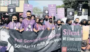  ??  ?? Durban University of Technology students call for people to break the silence on violence against women, marching from Steve Biko Campus to Durban Ciy Hall with duct tape on thair mouths this week.