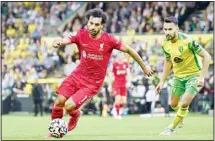  ?? (AP) ?? In this Aug 14, 2021 file photo, Liverpool’s Mohamed Salah runs with the ball during the English Premier League soccer match against Norwich City at Carrow Road Stadium in Norwich, England.