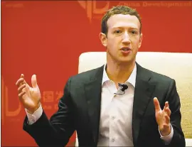  ?? THE ASSOCIATED PRESS ?? Facebook CEO Mark Zuckerberg, seen speaking in Beijing last year, wrote recently about the efforts of outside parties’ attempts to influence the 2016presid­ential election using the social media platform. “For the ways my work was used to divide people...