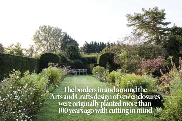  ??  ?? Above Crisp outlines of yew, forming walls and entrances, were implemente­d at least 100 years ago. With the garden’s solid structure, flower borders that are spent in terms of cutting, are allowed to romp and go to seed.