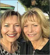  ?? COURTESY OF JOANIE COOMBS ?? Sisters Joanie Coombs and Dianna Farmer might as well be twins they are so close.