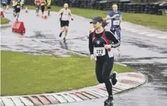  ?? ?? ON THE RUN: Stainland Lions’ Rebecca O’Neill in the Wombwell 5 Mile road race. Pic: Andrew Swales Photograph­y