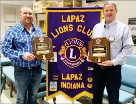  ?? PHOTO PROVIDED ?? Shown with their Melvin Jones Fellow plaques are Lions Craig Hawley and Steve Davis.