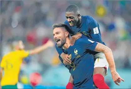  ?? AP ?? France's Olivier Giroud (L) celebrates with Ousmane Dembele after scoring against Australia in their World Cup group D match in Al Wakrah, Qatar on Tuesday.