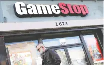  ?? JUSTIN SULLIVAN/GETTY IMAGES FILES ?? Gamestop's stock dived more than 10 per cent on the day after its earnings report over the past 10 quarters; cumulative losses topped US$1.4 billion in eight of those periods.