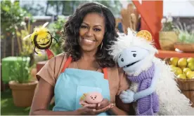  ?? Photograph: Adam Rose/AP ?? Michelle Obama in Waffles + Mochi: nutritiona­l, geographic­al, emotional – a soup any open-hearted person can get behind.