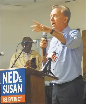  ?? Emilie Munson / Hearst Connecticu­t Media ?? Democratic gubernator­ial nominee Ned Lamont takes his campaign to a rally at the Bethel African Methodist Episcopal Church in New Haven on Saturday.