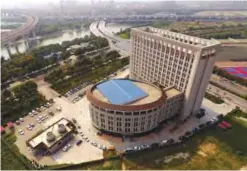  ??  ?? ZHENGZHOU: Photo shows an aerial view of the building of the Career and Entreprene­urship Comprehens­ive Service Base of University Graduates in Zhengzhou in China’s central Henan province. China has another entry when it comes to buildings that look...