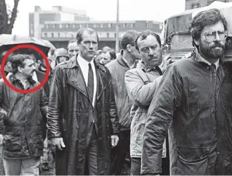  ??  ?? Connection­s: Alfredo ‘Freddie’ Scappaticc­i, circled – alleged to be Stakeknife – at an IRA man’s funeral in 1988 where Gerry Adams, far right, carried the coffin